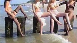 young innocent brunette plays outside at the beach - porn video